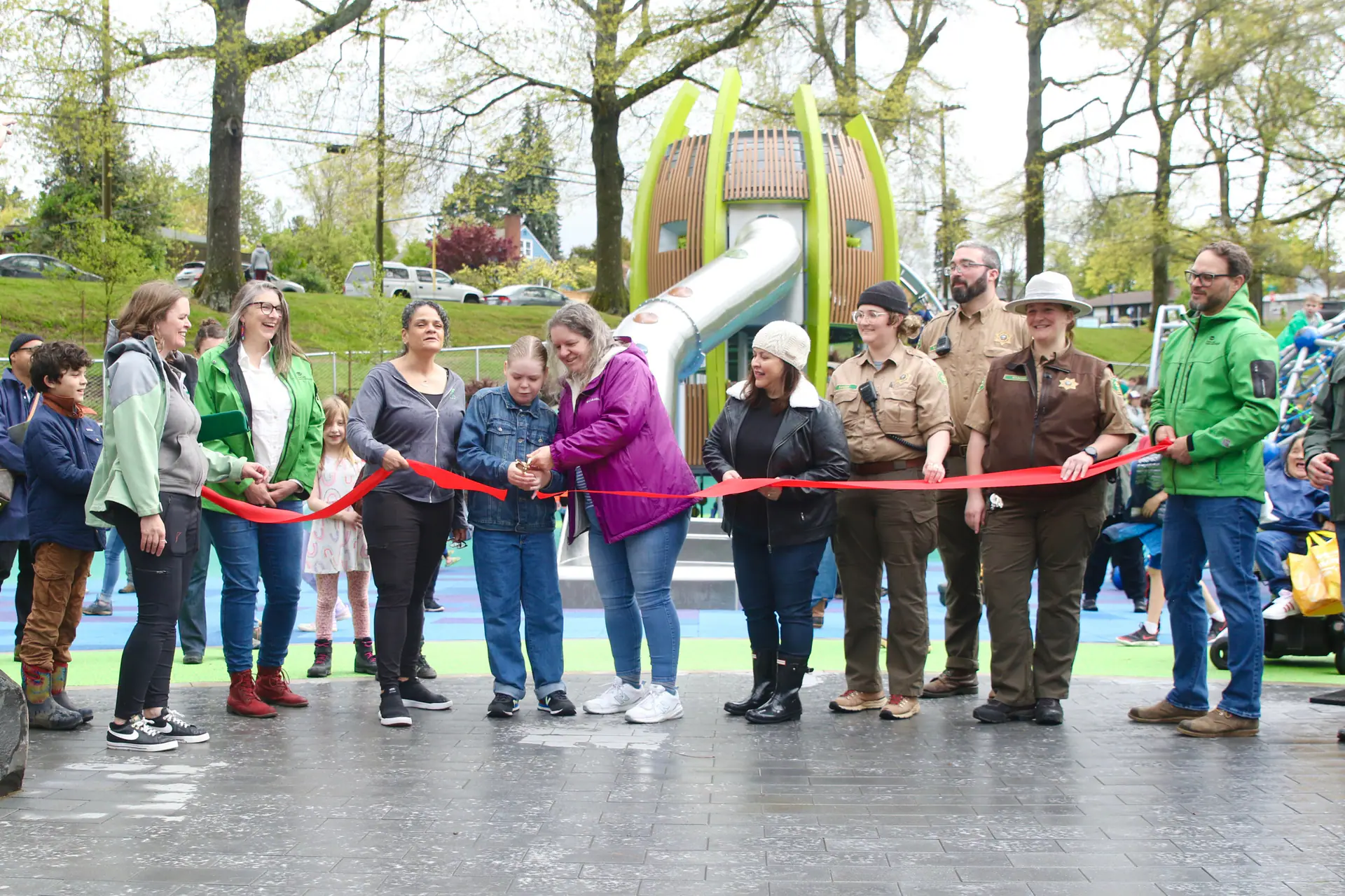 Families and Portland Parks staff at the opening of Gabriel Park Inclusive Playground in Portland