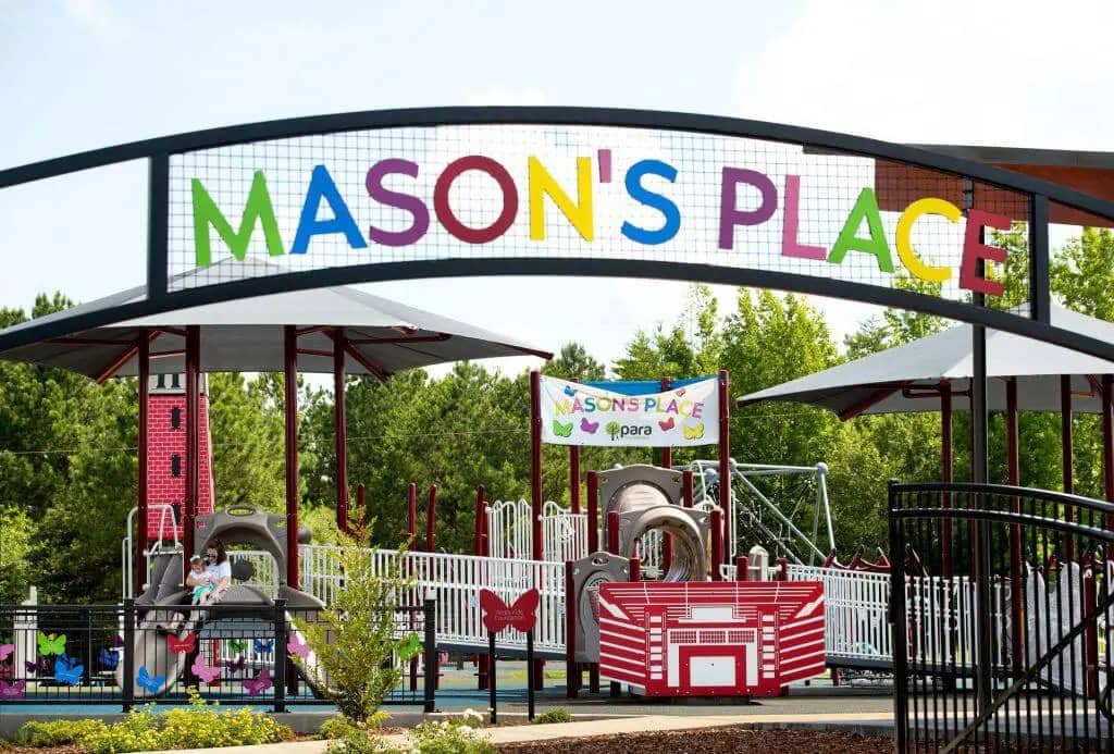 Main play structure at Mason's Place all-inclusive playground in Northport
