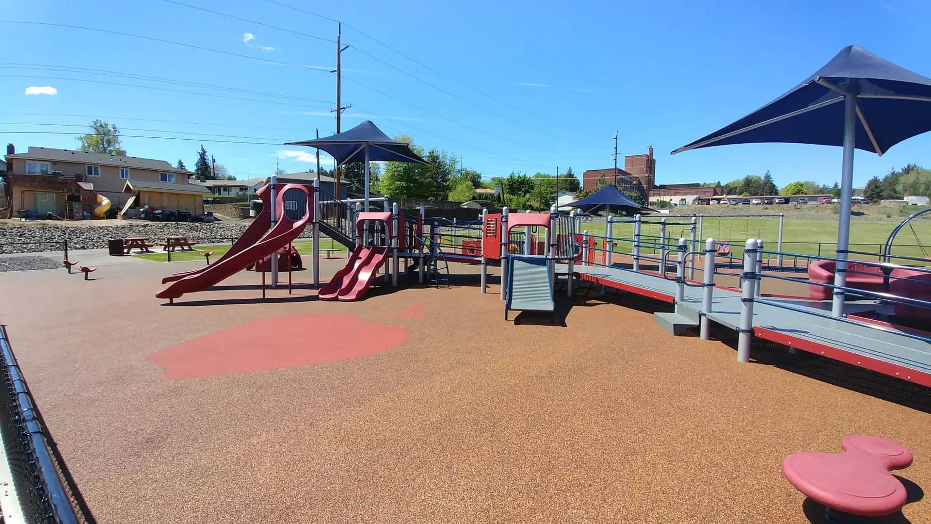 Inclusive swings and playground area at Volunteer Park