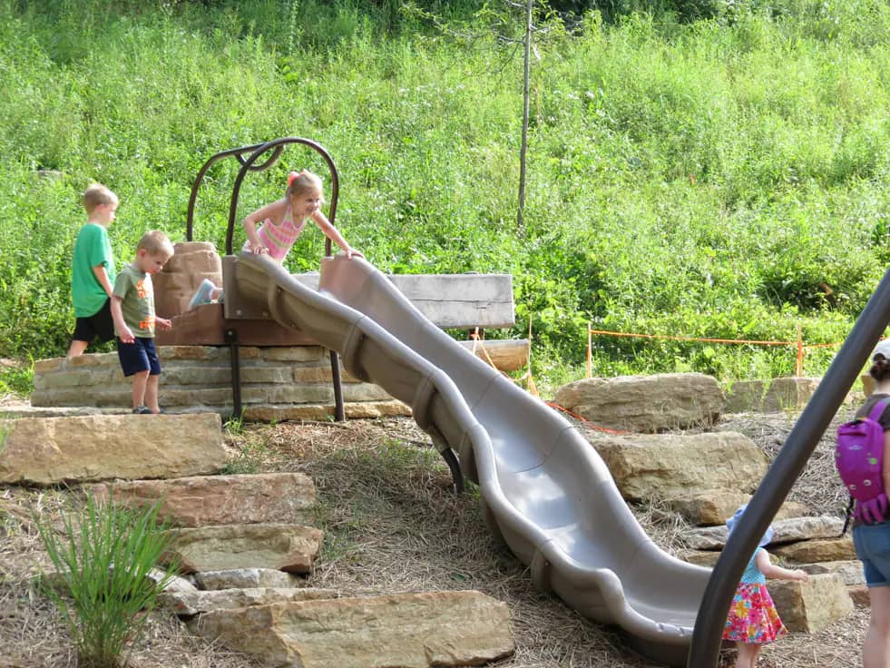 Natural climbing and imaginative play elements at NaturePlay@BCM